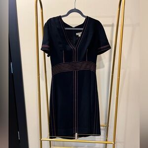 Burberry black dress with red stitch detailing.